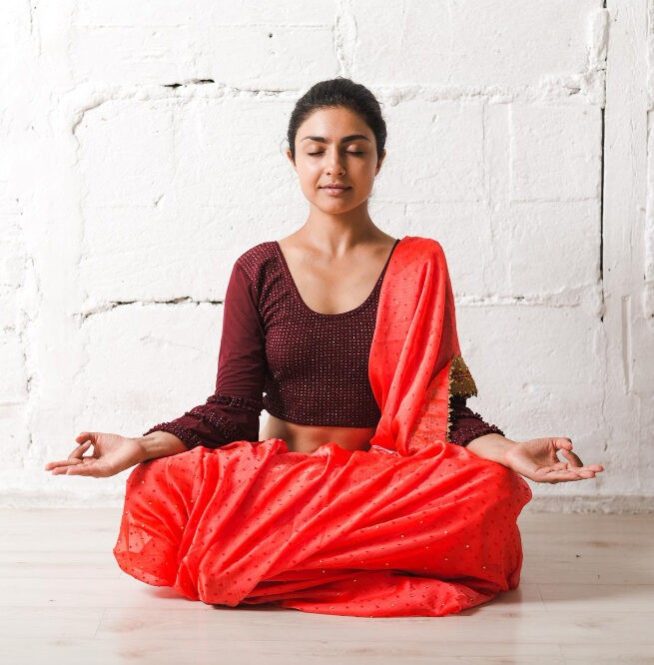 young-adult-indian-woman-sari-meditating-yoga-lotus-pose-zen-like-with-ok-sign-mudra-gesture
