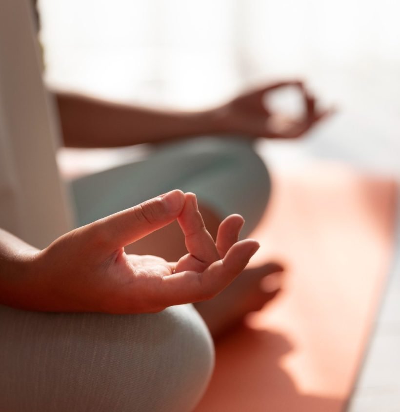 close-up-kid-meditating-mat