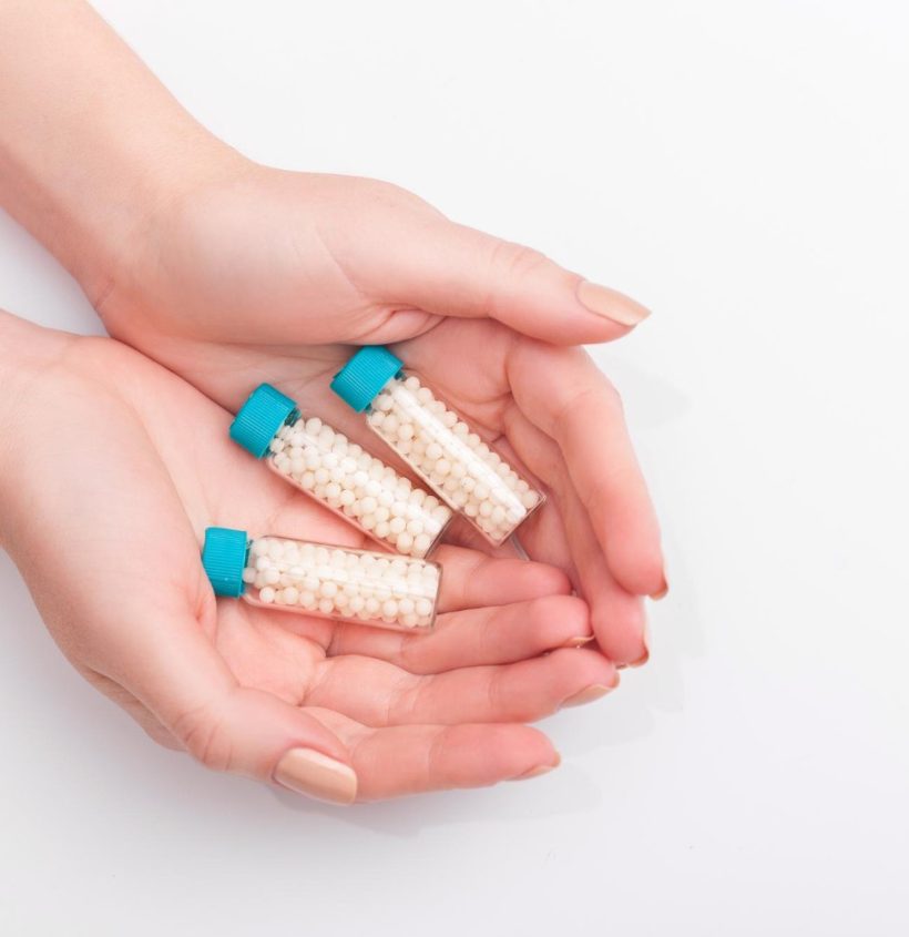 closeup-image-homeopathic-medicine-consisting-pills-bottle-containing-liquid-homeo